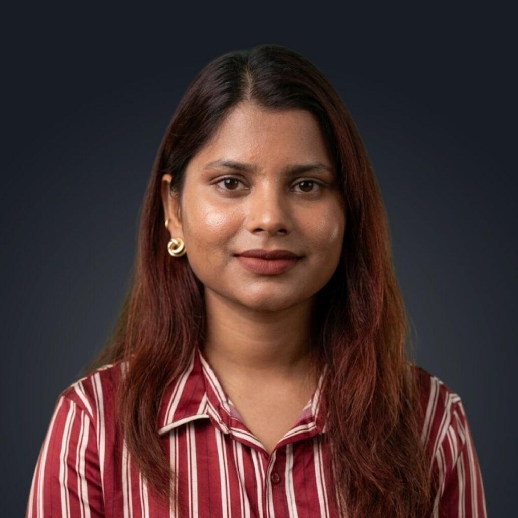 Person with long hair, striped shirt.